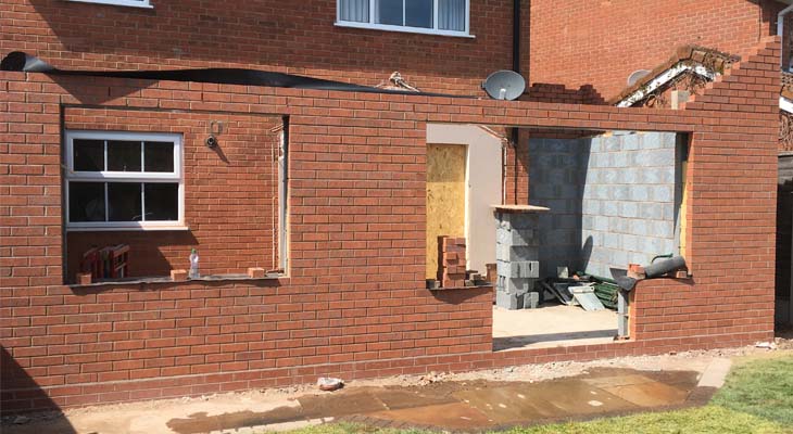 Ground floor walls erected with catnic lintels fixed into position
