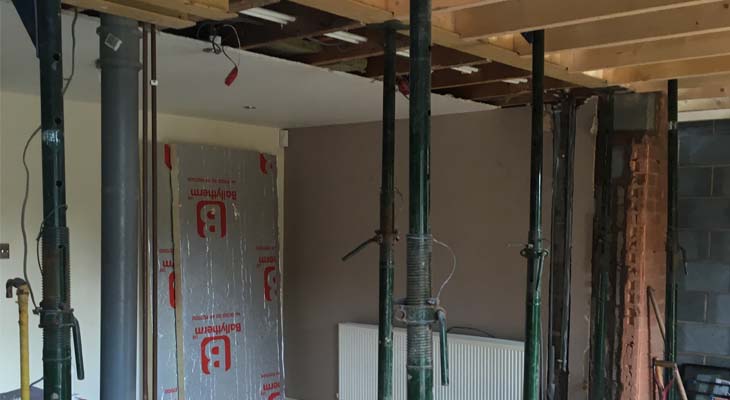 Internal view of the ground floor with acros holding up the house