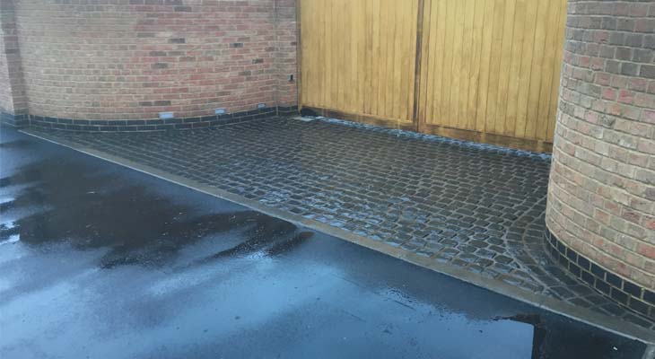 Third party contractor asphalted up to kerb boundary Third party contractor asphalted up to kerb boundary