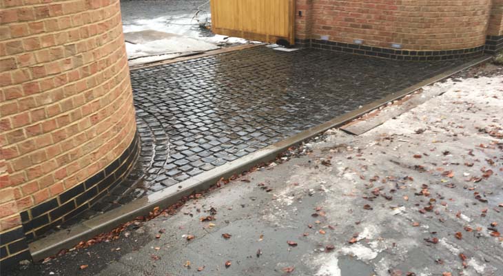 Cobbled border and driveway completed Cobbled border and driveway completed