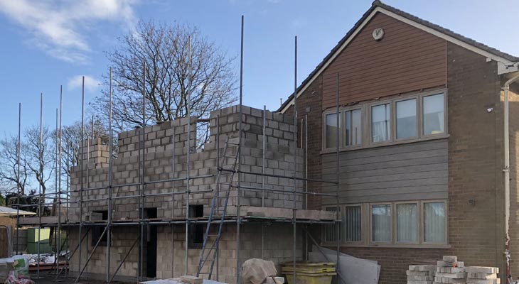 Taking the blockwork around the side of the house.