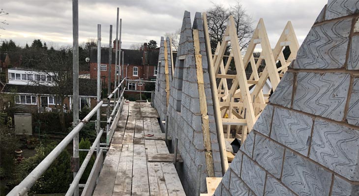 Close up of blockwork cut ups being installed by Kirk Yates Building.