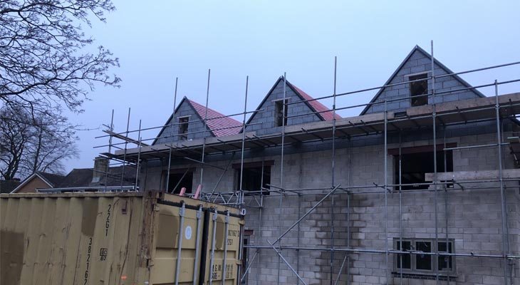 View of the rear elevation blockwork nearing completion.